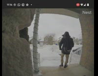 Security ring camera of person slipping on front porch in snow weather