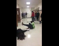 Guy kicks girls calves school hallway 