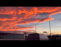 Orange sunset clouds on the sky