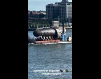 Collab WINY - Big black submarine transporting in Seaport