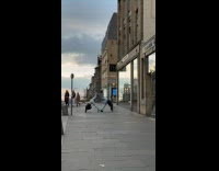 Collab IITW - Two women handstand feet together attempt on the sidewalk