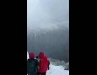 Collab PubityPets - Men Trek Downhill on Snow Covered Mountain