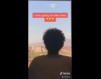 Guy goes bike ride green screen