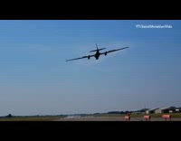 White car drives towards landing airplane runway 