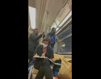 Man screams for help while another writes in notebook