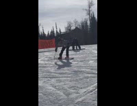 boy struggling to stay up snowboard