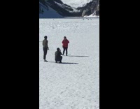 woman red sweatshirt peace sign mountain