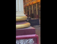 Blonde girl red dress spin skirt london