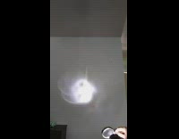 Flashlight and magnifying glass make cool reflected light