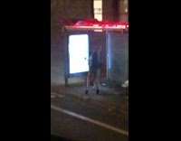 Two girls school girl costumes bus stop 