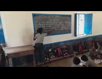 Young girl teaches students in rural school 
