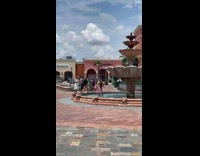 Collab IITW - Woman pink skirt poses in water fountain