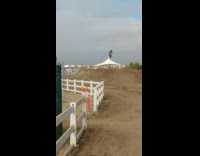Kid on dirt bike riding through the track
