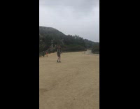 Man Claps Feet in the Air at Hollywood 