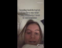 Girl goes back to bed after breakfast 