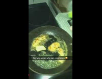 Guy pours mountain dew on the food he is cooking