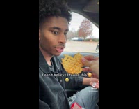 Girl hands guy heart shaped waffle fry