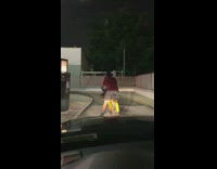 Guy goes to drive thru on bicycle 