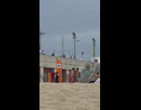 Nun removes clothes and reveals bikini to a man