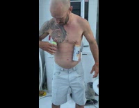 Guy opens cans with nipple piercings boat 