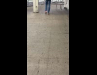 Submitter shows man walk barefoot at station