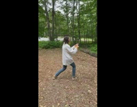 Woman takes the picture and directs her family