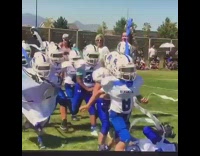 Kids run through sign fall fail football 