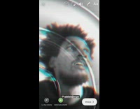 Guy looks into the distance with water ripple filter and song