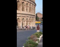 Collab IITW - Man jump shot with Coliseum behind him