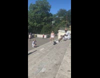 Pink sweater white skirt girl steps guitar 