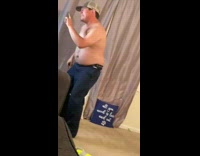 Shirtless guy body rolls to country song
