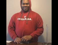 Red indiana sweater guy money stacks gun 