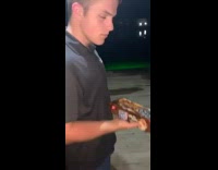 Guy eats fish inside cookie packaging