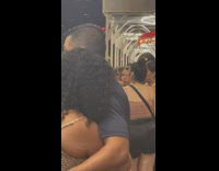 Woman brushes teeth in line 