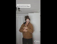 Woman does robotic isolation dance 