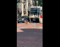 Collab IITW - Lady Lays on Ground in Front of Train