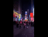 Girl group dancing at times square