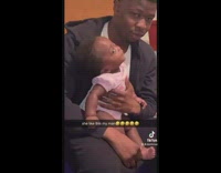 Baby Shakes Head as Lady Calls Her