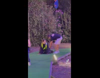 Woman strapped onto ride spins in air