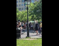 Biker balances on one tire
