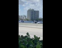 White sports car couple ocean bikers 