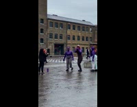 Three women violet hoodie dance at park