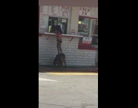 Little girl boosting other little girl fast food window part 2