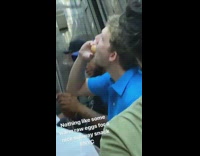 Guy in blue polo shit eats raw brown eggs on the subway train
