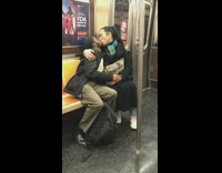 Couple makes out in public on subway train