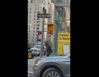 Pedestrian stop light hangs but still works 