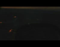 Truck carrying hay bales on fire car