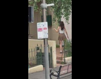 Woman tiktok dance while a man disagrees with her