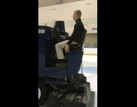 Guy plays The Circle game while riding ice rink cleaning machine