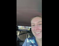 Girl in car mystery face bus approaches back 